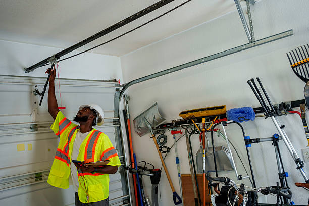 Professional Garage Door Panel Replacement technician working in Strodes Mills, PA